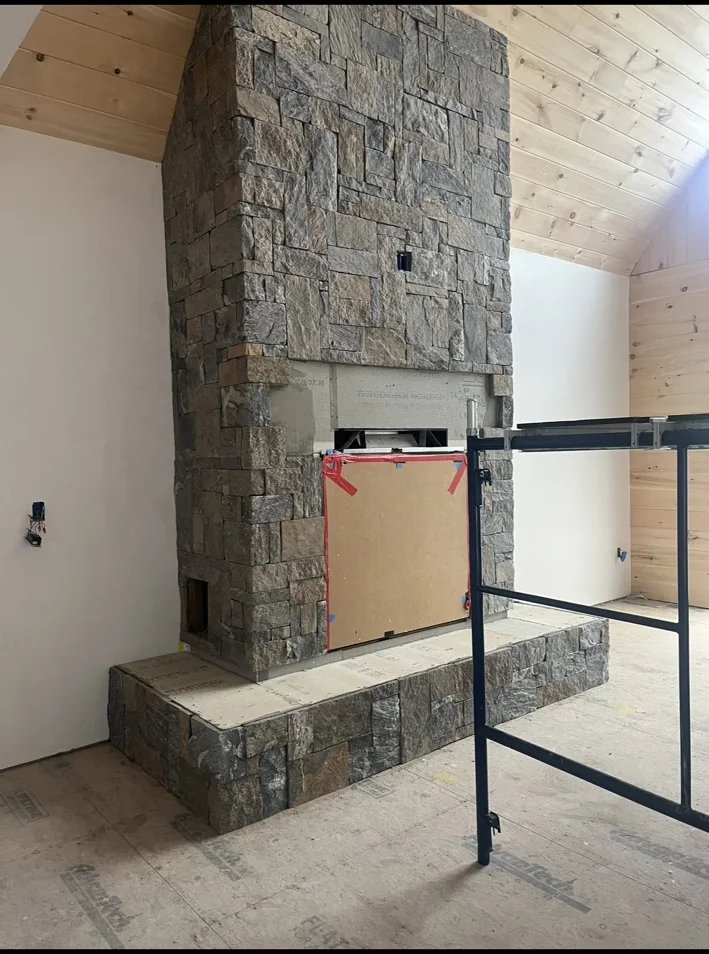 Indoor stone fireplace build