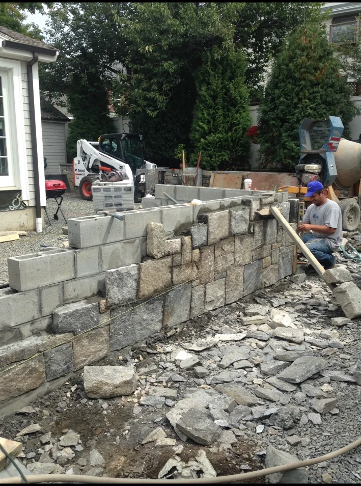 Stone veneer wall construction